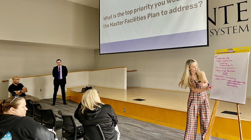 Lakota Schools Superintendent Ashley Whitely writes down suggestions for facilities priorities solicited from audience members at a recent public forum at MidPointe Library. The meeting was the latest in a series of outreach programs to encourage public participation as Lakota officials create a new facilities plan. (Photo By Michael D. Clark/Journal-News)