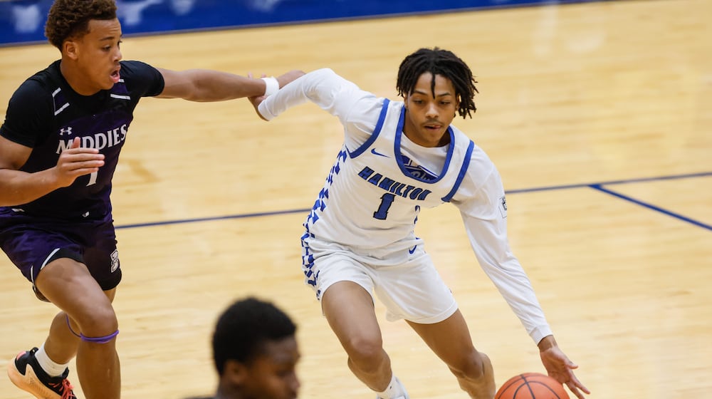 Hamilton's Khamauri Bridges-Sawyer dribbles the ball during their basketball game against Middletown Friday, Jan. 23, 2026 at Hamilton High School. Hamilton won 62-57. NICK GRAHAM/STAFF