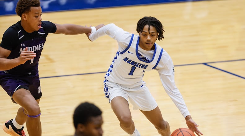 Hamilton's Khamauri Bridges-Sawyer dribbles the ball during their basketball game against Middletown Friday, Jan. 23, 2026 at Hamilton High School. Hamilton won 62-57. NICK GRAHAM/STAFF