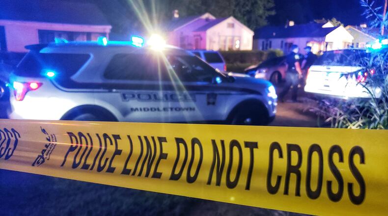 Police and fire crews responded to a house fire in August in the 1200 block of Lind Street in Middletown. NICK GRAHAM/STAFF