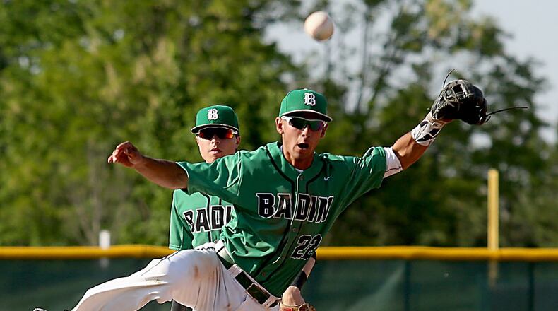 Badin shortstop Daunte DeCello gets the force out on Reading’s Jacob Courtney and throws to first base for a 6-3 double play Sunday during a Division II district baseball final at Mason. CONTRIBUTED PHOTO BY E.L. HUBBARD