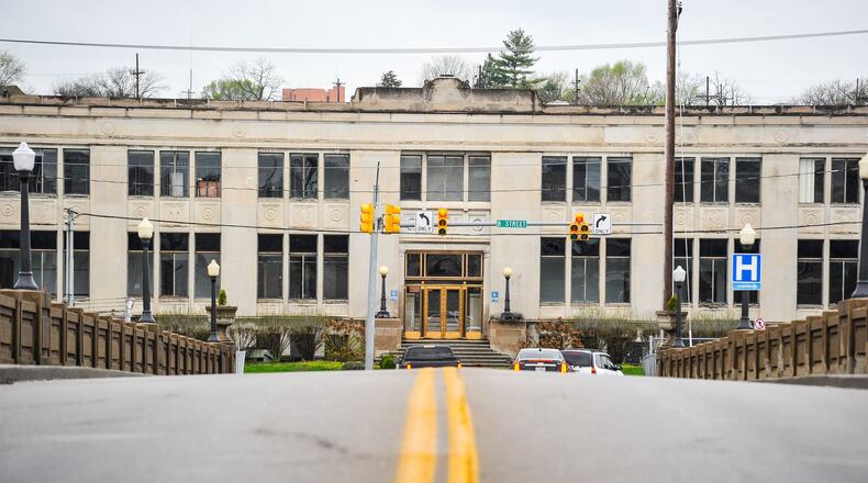 The historic Champion Paper administration building, located across North B Street from the Black Street Bridge, likely will become a boutique hotel as part of the gigantic Spooky Nook sports complex. In deciding how to transform the Hamilton office building into an appealing hotel, Sam Beiler, who created the original Spooky Nook facility in Manheim, Pa., said he took some pointers from President Donald Trump’s Trump International Hotel, located in a former Washington, D.C. post office. NICK GRAHAM/STAFF