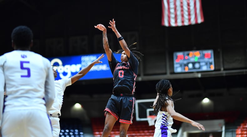 Lakota West’s Bryce Curry puts up a shot during his Division I regional final against Pickerington Central on Saturday at the Ohio Expo Center. KYLE HENDRIX / CONTRIBUTED