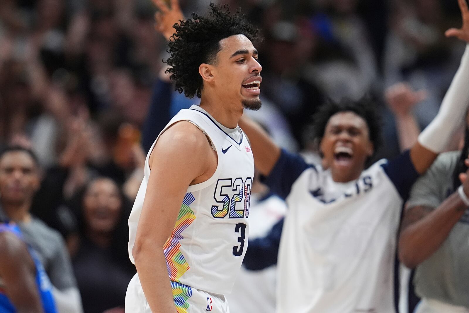 Denver Nuggets guard Julian Strawther reacts after hitting a 3-point basket late in the second half of Game 6 in the Western Conference semifinals of the NBA basketball playoffs against the Oklahoma City Thunder Thursday, May 15, 2025, in Denver. (AP Photo/David Zalubowski)