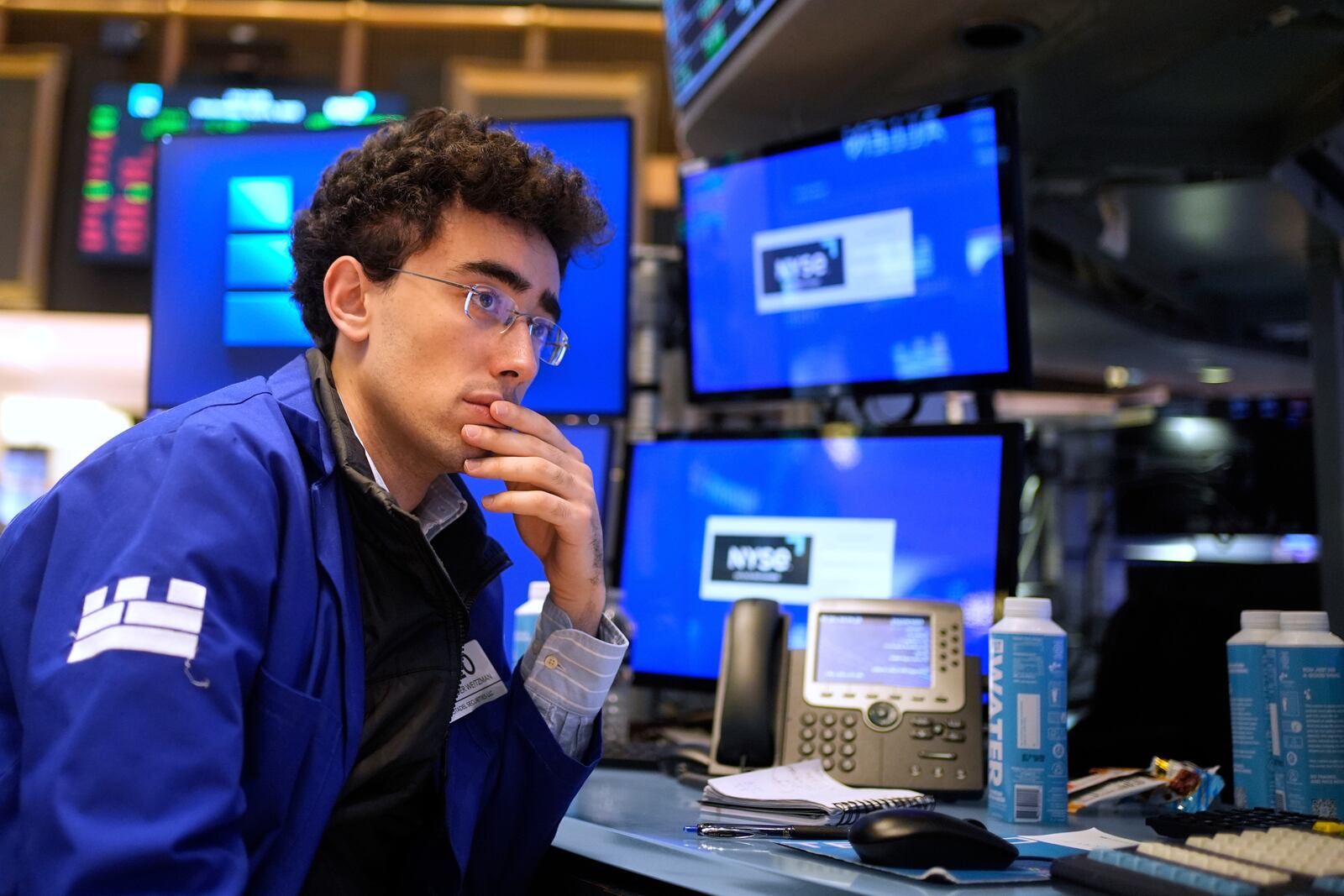 Alex Weitzman works on the floor at the New York Stock Exchange in New York, Wednesday, April 9, 2025. (AP Photo/Seth Wenig)