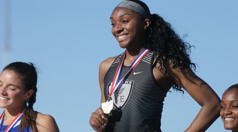 Lakota East's Azariyah Bryant stands atop the podium after winning the 200 at the Division I track championships on Saturday, June 4, 2022, at Jesse Owens Memorial Stadium in Columbus. David Jablonski/Staff