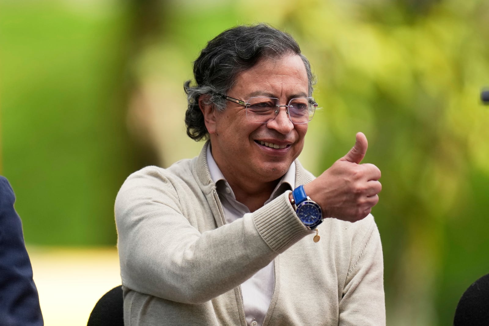 Colombia's President Gustavo Petro gives a thumbs up before signing a labor reform bill into law, in Bogota, Colombia, Wednesday, June 25, 2025. (AP Photo/Fernando Vergara)