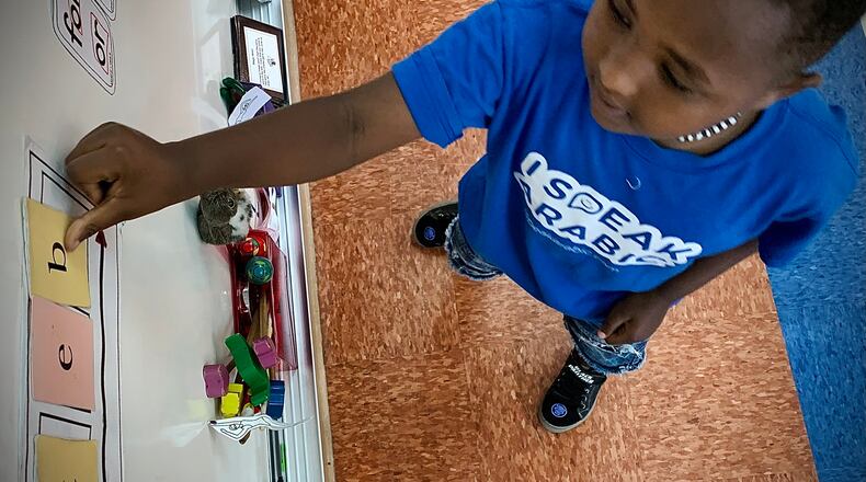 Temesgen Tesemaa sounds out words in Lauren Fields kindergarten class at Stevenson Elementary on Wednesday June 15, 2022. MARSHALL GORBY\STAFF
