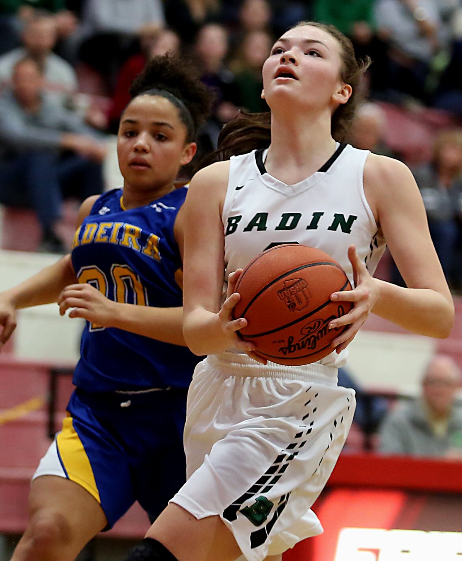 Badin guard Shelby Nusbaum beats Madeira’s Camryn Stallworth to the basket Saturday afternoon during a Division III sectional final at Fairfield Arena. CONTRIBUTED PHOTO BY E.L. HUBBARD