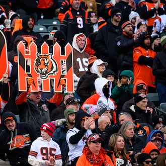 Cincinnati Bengals fans hold up a defense sign during game against the Cleveland Browns on Sunday, Jan. 4, 2026 at Paycor Stadium. JEREMY MILLER / CONTRIBUTED PHOTO