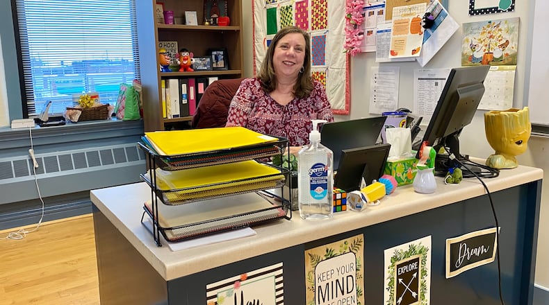 At Hamilton’s Miami School in the Rossville Flats neighborhood, a block from the city’s Main Street, Sherrie Morrison looks back on major trends as she continues in her 36th year at Hamilton Schools. Morrison is one of two veteran city school instructors with a longevity record for that long. (Photo By Michael D. Clark/ Journal-News)