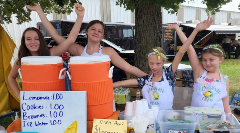 These four Butler County girls have raised money for less fortunate kids the last two years by selling lemonade. They raised more than $4,000 last year and the goal this year is $5,000. From left, Terre Merrill, Emma Merrill, Myaha Paynter and Aria Merrill. CONTRIBUTED