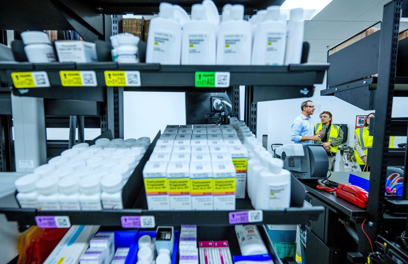 FILE - Media and local officials tour a new Amazon pharmacy, adjacent to a fulfillment center, in Corona, Calif. on Wednesday, May 29, 2024. (Terry Pierson/The Orange County Register via AP, File)