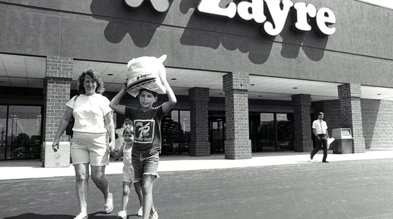 Sandy Johnson of Hamilton leaves the Zayre store on Ohio 4 in Hamilton with her children, Jennifer and Chad, in 1987.