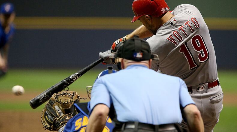 MILWAUKEE, WI - SEPTEMBER 23: Joey Votto #19 of the Cincinnati Reds hits a single in the fourth inning against the Milwaukee Brewers at Miller Park on September 23, 2016 in Milwaukee, Wisconsin. (Photo by Dylan Buell/Getty Images)