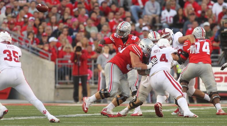J.T. Barrett passes against Indiana. David Jablonski/Staff