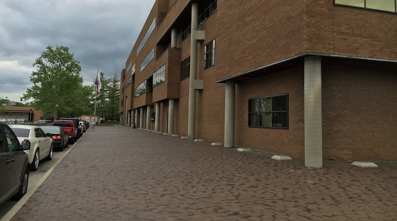 Middletown City Council approved two more small business grants
The six-sided pavers in front of the building occupied by Middletown city government and the city’s school district are a trip-hazard liability that insurers have asked the city to remove, but replacement would cost hundreds of thousands of dollars. MIKE RUTLEDGE/STAFF