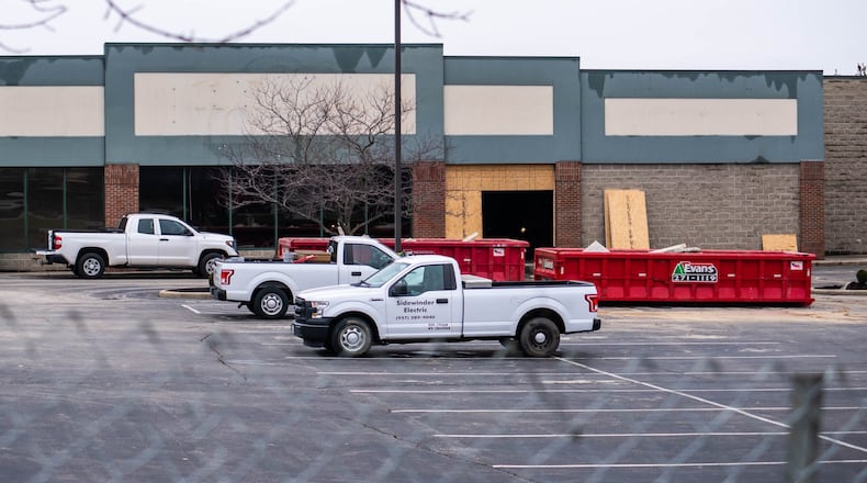 Contractors are already at work transforming the former IGA grocery into the new Monroe Police Headquarters on South Main Street. NICK GRAHAM/STAFF