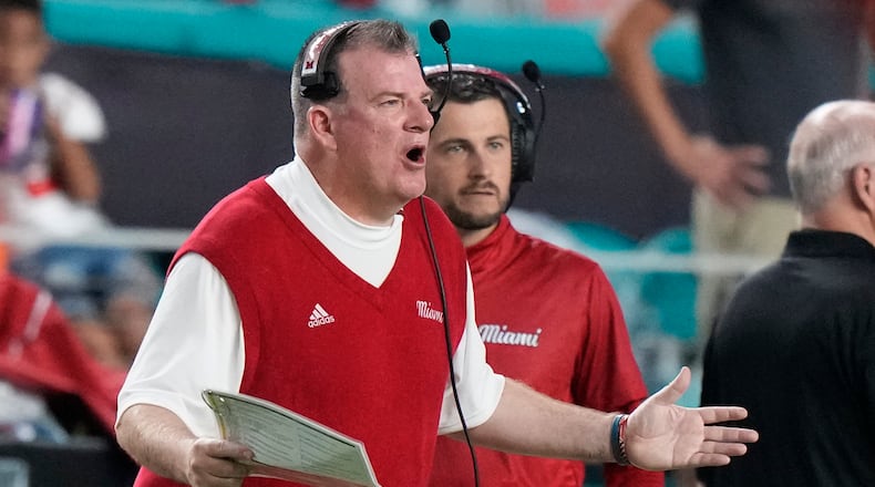 Miami (Ohio) head coach Chuck Martin calls out a play during the first half of an NCAA college football game against Miami, Friday, Sept. 1, 2023, in Miami Gardens, Fla. (AP Photo/Wilfredo Lee)