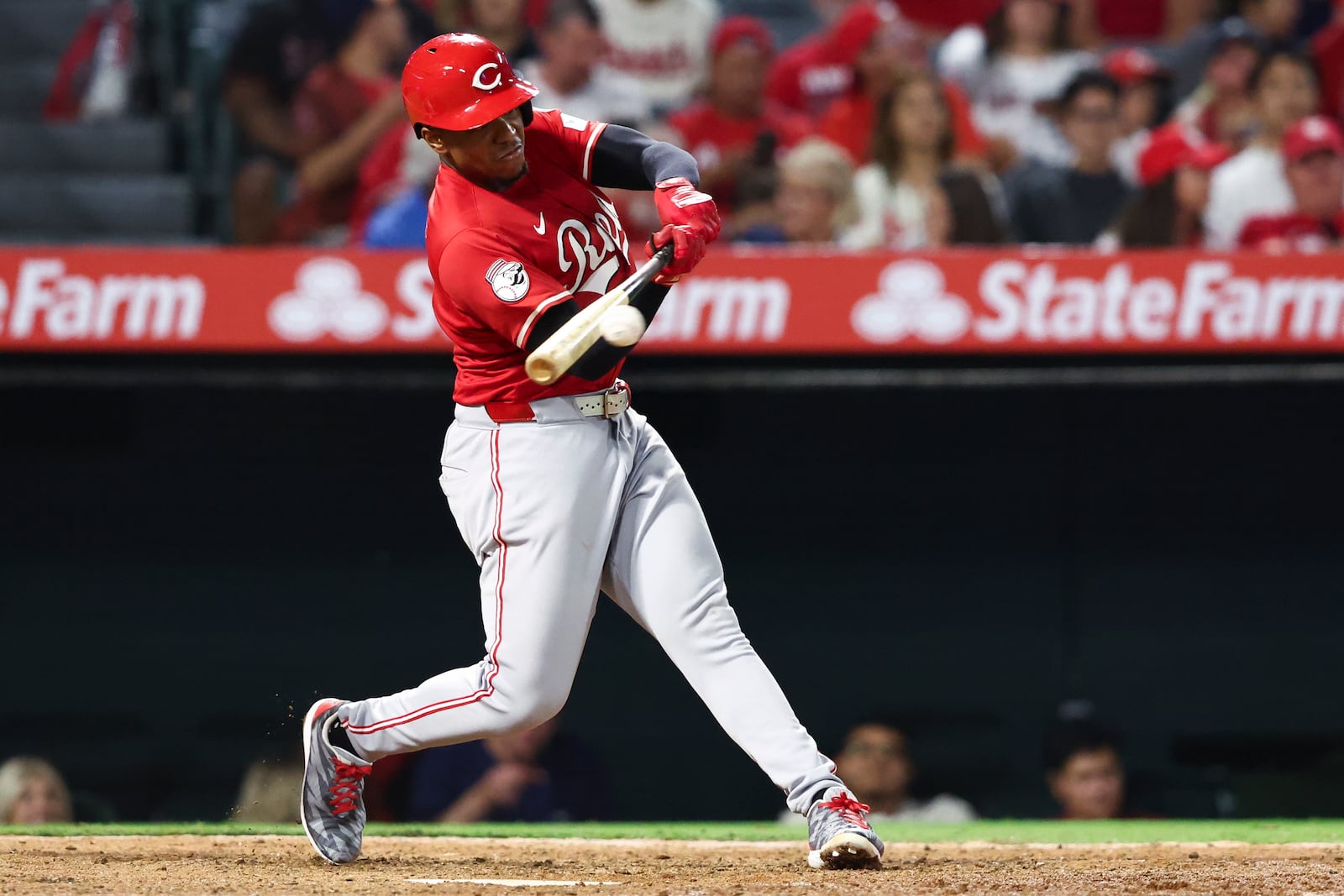 Cincinnati Reds' Ke'Bryan Hayes hits a triple during the eighth inning of a baseball game against the Los Angeles Angels, Monday, Aug. 18, 2025, in Anaheim, Calif. (AP Photo/Jessie Alcheh)
