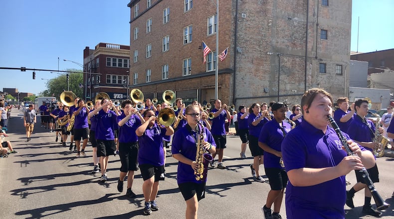 Thousands of all ages lined the city streets of Middletown for the annual Memorial Day parade through the Butler County city Monday. The parade included military veterans, honor guards, police, firefighters, city and business officials and the Middletown High School marching band.