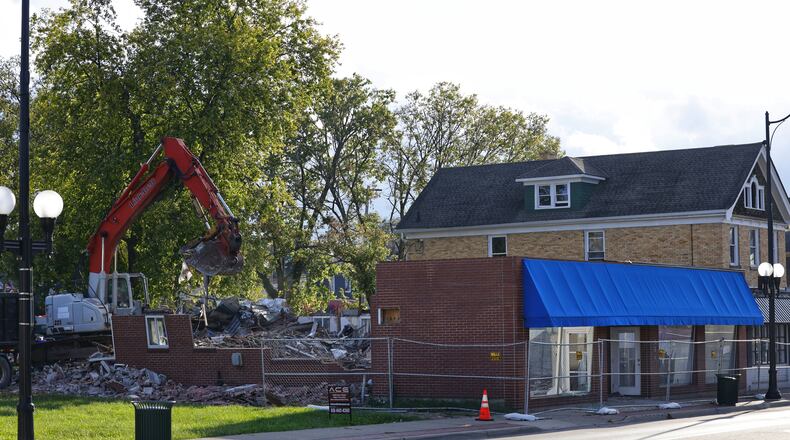 Demolition is happening this week to make progress toward the Rossville Flats complex in Hamilton. It will include about 75 to 80 apartments in the 300 block of Main Street. Frost Factory, which has been a hit at Liberty Center with real-fruit slushies for adults and kids, including alcohol for the adults, signed a lease to open a second location next year on the street level of the complex. Officials say it is the first new construction of apartments in the commercial stretch of Main Street near the Great Miami River in about a century. NICK GRAHAM / STAFF