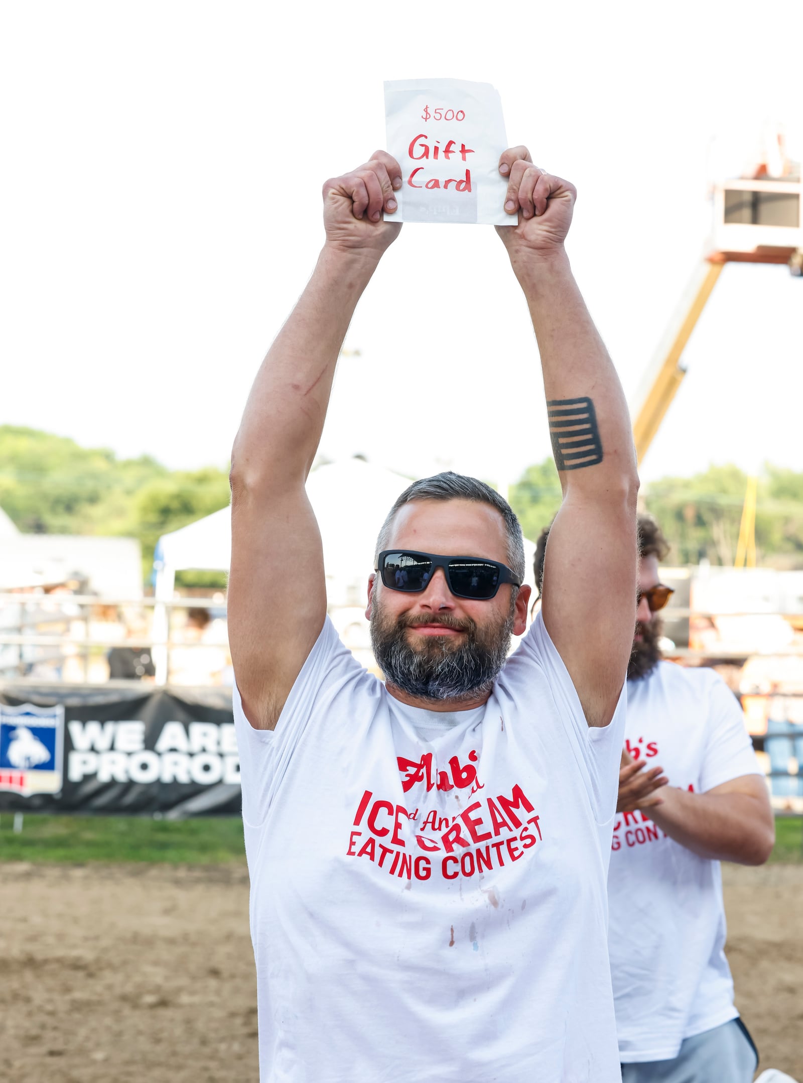 The Flub's 2nd Annual Ice Cream Eating Contest was held in front of the grandstand crowd during the Butler County Fair Tuesday, July 22, 2025 in Hamilton. The winner, Michael Thom, finished over 4 pints of ice cream and a slushie in 10 minutes to win a $500 gift card to Flub's. NICK GRAHAM/STAFF