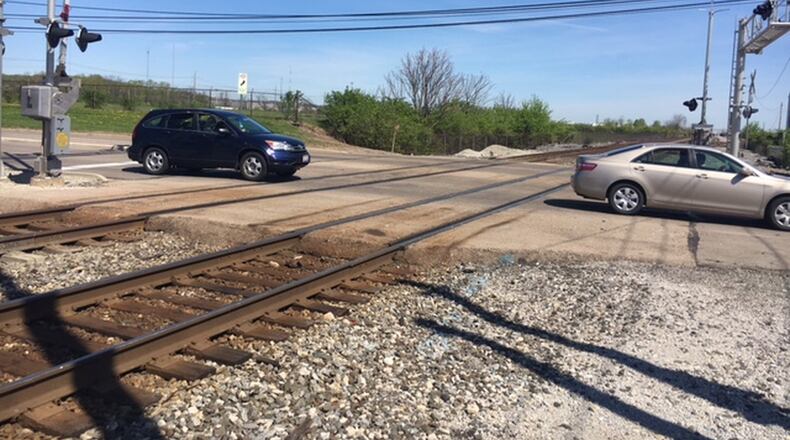 Moraine police have cited Norfolk Southern Railroad eight times this year for blocking traffic at the Main Street crossing between Ohio 741 and Dryden Road. NICK BLIZZARD/STAFF