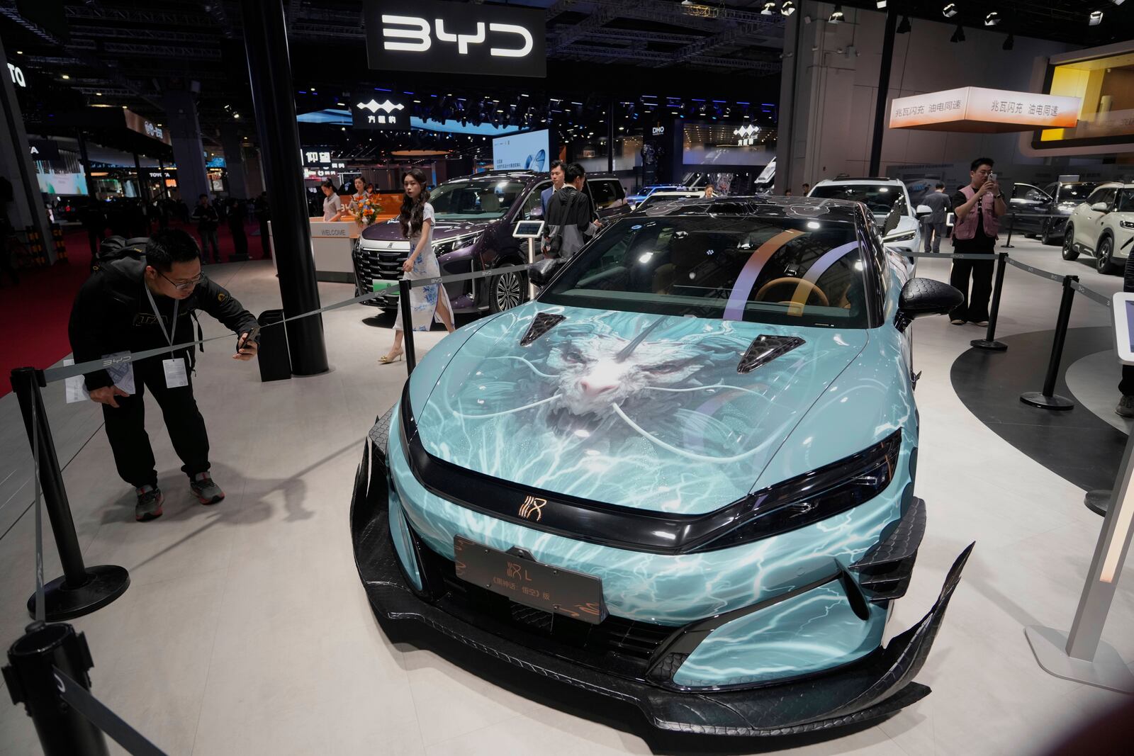 A BYD Han L car model inspired by Black Myth: Wukong is displayed at the Auto Show in Shanghai, Wednesday, April 23, 2025. (AP Photo/Ng Han Guan)