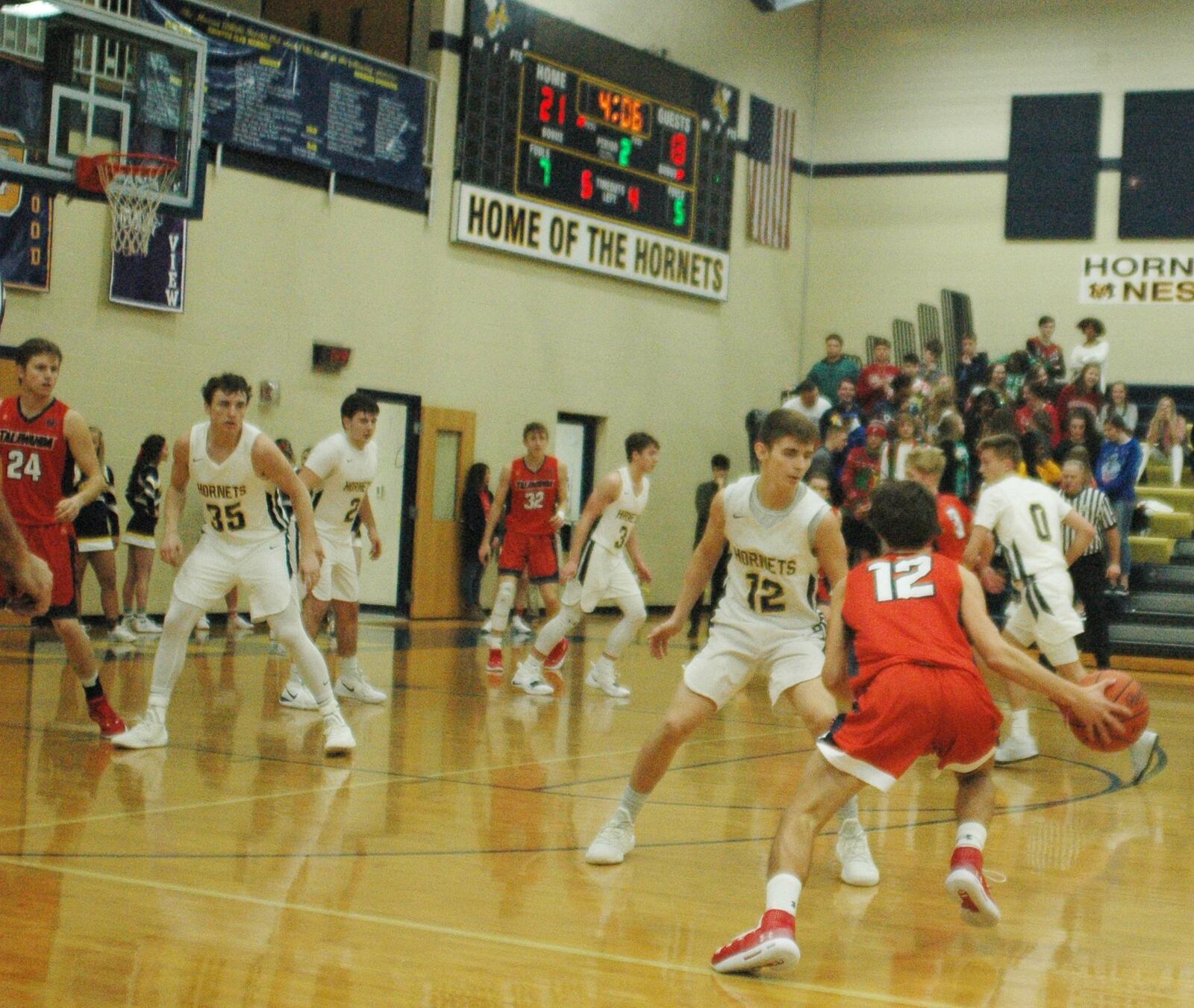 Talawanda’s David Kraushar tries to dribble around Monroe’s Shawn Poindexter during a game at Monroe on Dec. 22, 2018. The host Hornets won 63-33. RICK CASSANO/STAFF