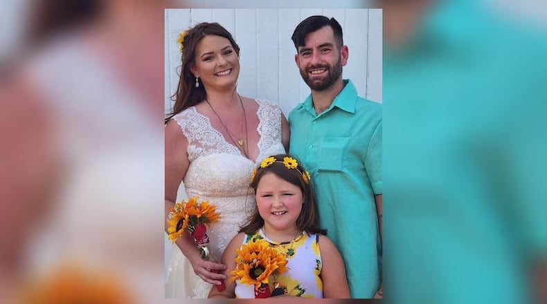 Sarah and Andy Cope got married at the Butler County Fair on Sunday, July 23. It was four years to the day since Sarah's daughter, Ava, introduced the couple. CONTRIBUTED