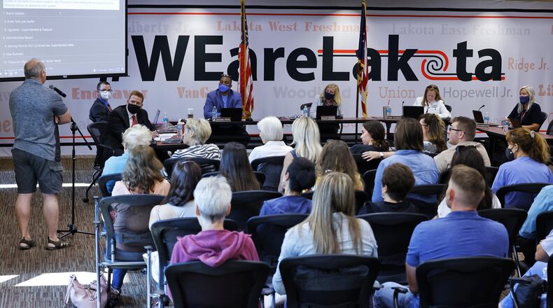 Lakota School Board members listen to community members voicing their concerns on masking versus not masking students for the upcoming school year during a meeting Thursday morning, Aug. 5, 2021 at Lakota Plains Junior School. NICK GRAHAM / STAFF