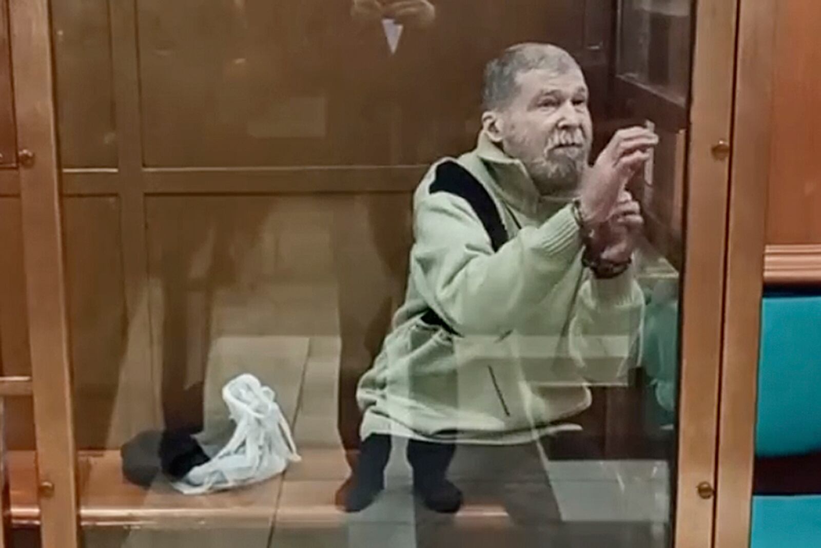 FILE - In this photo taken from video released by the Moscow City Court Press Service, Stephen Hubbard, a U.S. citizen accused of fighting as a mercenary in Ukraine against Russia stands in a glass cage during a court session in the Moscow City court in Moscow, Russia, Oct. 7, 2024. (Moscow City Court Press Service via AP, File)