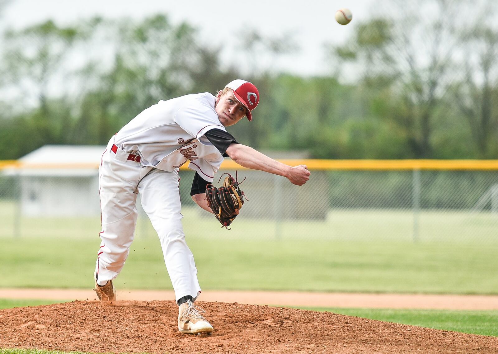 Carlisle’s Brandon Saylor works on the mound during Wednesday’s Division III sectional game against Preble Shawnee at Sam Franks Field in Carlisle. NICK GRAHAM/STAFF