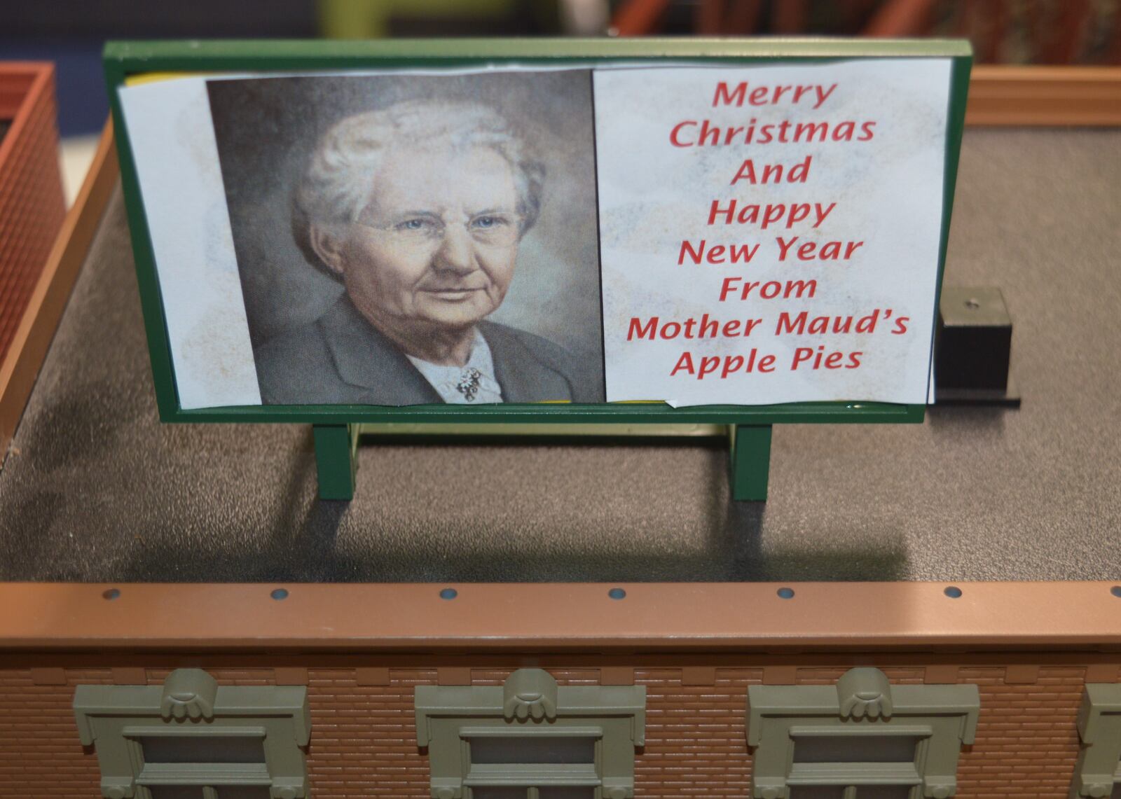 This Mother Maud’s Apple Pies billboard on the roof of one of the buildings in the Marshall Elementary train display is a tribute to the namesake of the school. CONTRIBUTED/BOB RATTERMAN