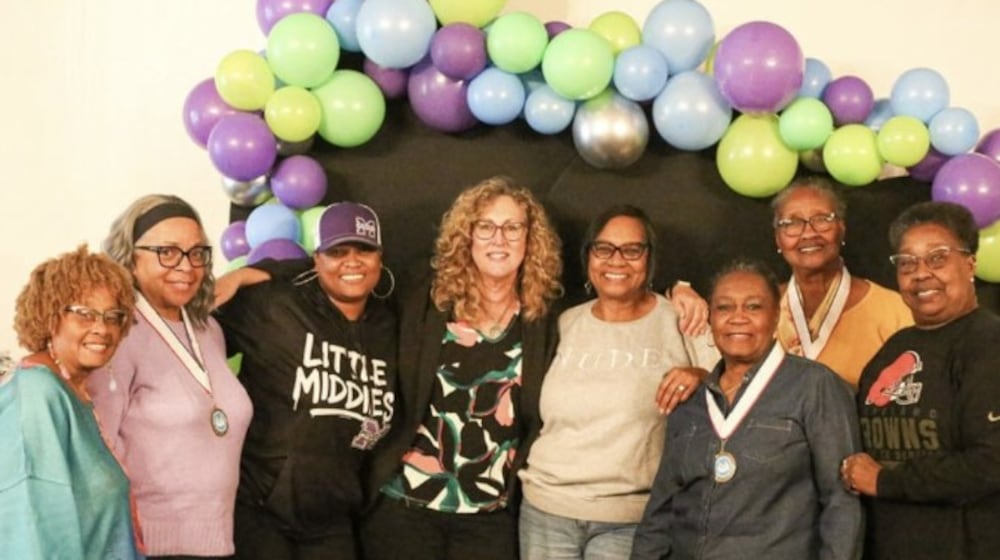 Three Middletown Community Ambassadors received recognition medals for their work at a recent awards ceremony. From left: Paulette Hill, Monteen Gates, Jordan Kavanaugh, Kristy Duritsch, Jackie Phillips-Carter, Regina Brooks, Paula Everhart and Charlene Dorn. CONTRIBUTED