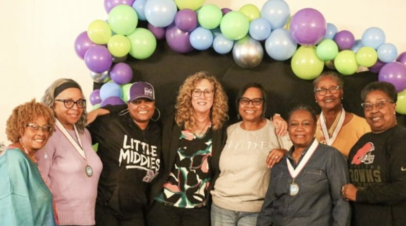 Three Middletown Community Ambassadors received recognition medals for their work at a recent awards ceremony. From left: Paulette Hill, Monteen Gates, Jordan Kavanaugh, Kristy Duritsch, Jackie Phillips-Carter, Regina Brooks, Paula Everhart and Charlene Dorn. CONTRIBUTED