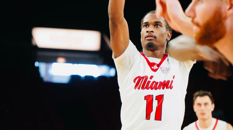 Miami's Mekhi Cooper (11) fires up a free throw against Wright State earlier this season at Millett Hall. Chris Vogt/CONTRIBUTED
