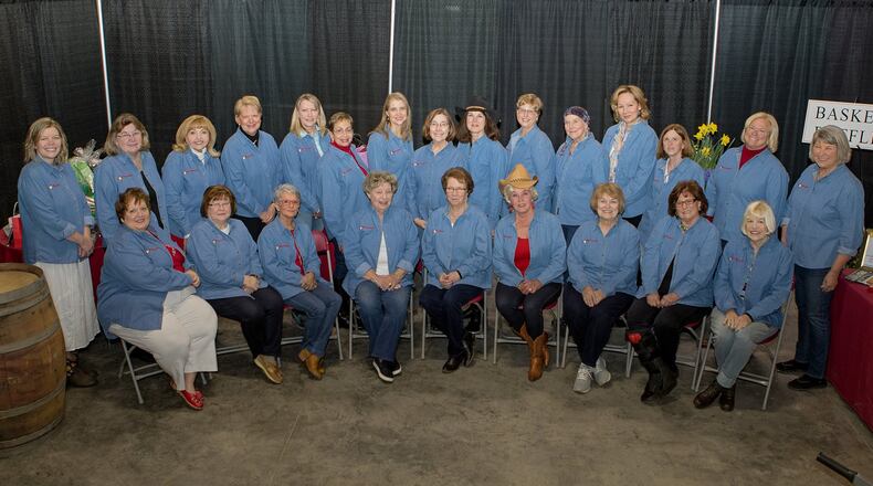 The Women Enriching Lives organized the “Let Imagination Bloom” luncheon, a fundraiser for the Dolly Parton Imagination Library that provides free books to local children. The committee, back row, from left: Cari Hillman, Sherry Terrell, Robin Becker, Judge Kathleen Dobrozsi Romans, Marci Sorrell, Peggy McClusky, Maria Langendorf, Cathy Howell, Anne Potteiger, Jo Ashworth, Kitty Blattner, Beth Hurst, Sandi Templeton, Beth Brockman, and Linda See; front row, from left: Rita Kolp, Brenda Gehm, Gayle Martz, Libby Abele, Ginger Bruggeman, Fran Sack, Elaine Garver, Kathryn Wood and Lynnette Schluter. Not pictured: Nancy Fairchild, Patti Gage, AJ Huff, Pam Pratt, Suzi Vitori, Amy Berlean and JoAnn Wagner. SUBMITTED PHOTO
