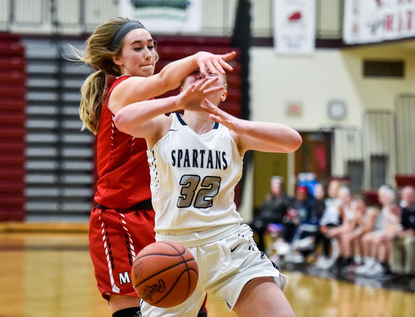 Valley View’s Aubrey Stupp is fouled by Madison’s Carley McMonigle during Thursday night’s Division II sectional game at Lebanon. Valley View won 63-17. NICK GRAHAM/STAFF