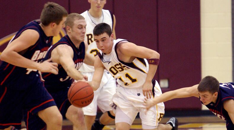 Ross point guard David Lane comes up with the ball as Talawanda guard Joe Even (3) attempts to make a steal at Ross on Jan. 5, 2007. Also on the play for the Braves are Josh Claytor and Rhys Newman. CONTRIBUTED PHOTO BY E.L. HUBBARD
