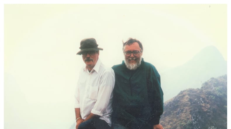 Mike Burgett and Don Kaufman are shown at the summit of Doi Chiang Dao after hiking up from the research station in Thailand in 1996. CONTRIBUTED