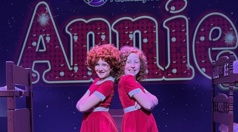 Emery McCullough, left, and Isabella McKinney play "Annie" in RISE UP Performing Arts' "Annie Jr." this weekend. The show has two different casts. CONTRIBUTED