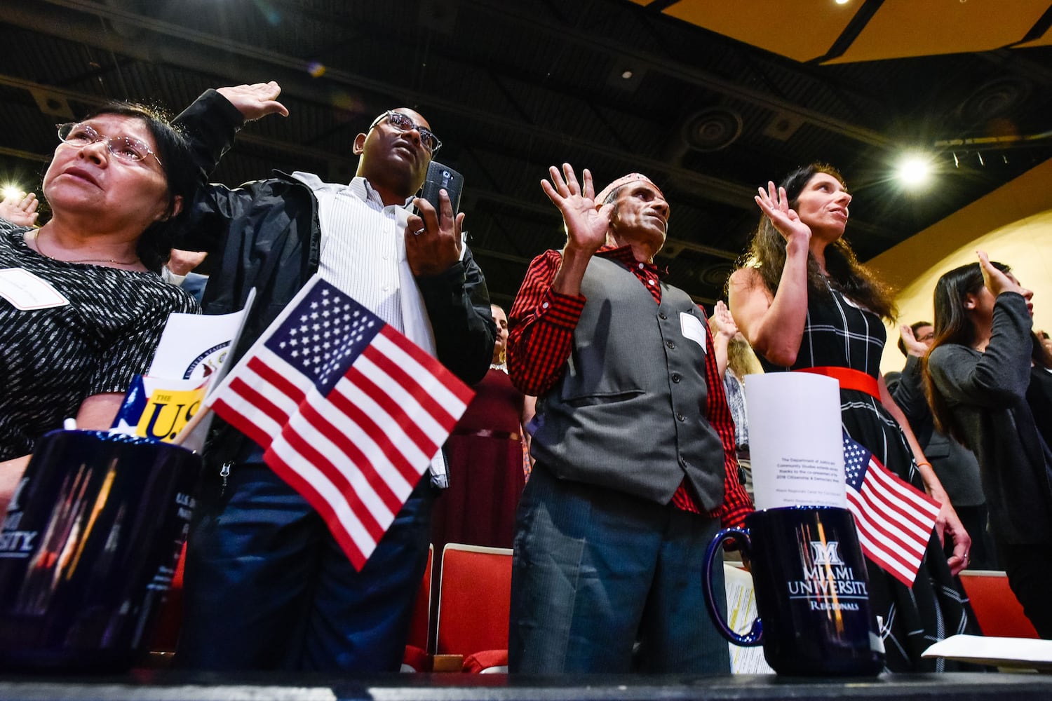 Nearly 100 people become U.S. citizens at naturalization ceremony at Miami Hamilton