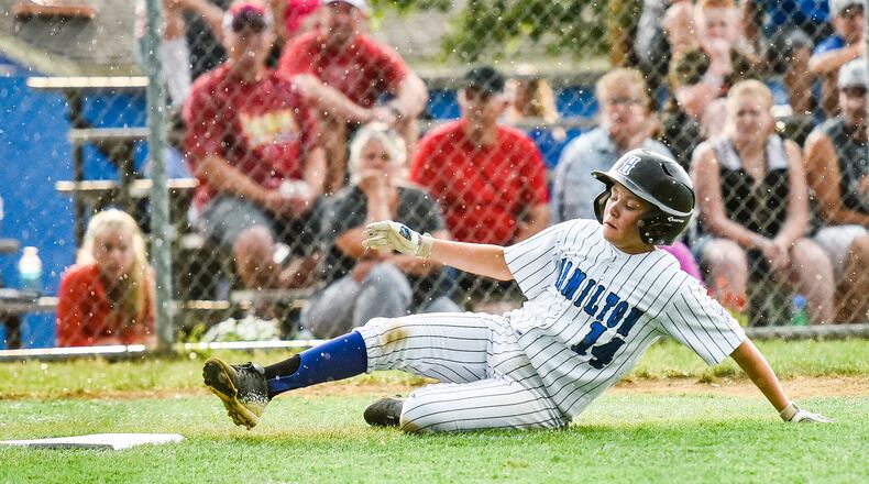 Hamilton West Side’s Nick Brosius slides safely into home plate during Tuesday night’s 10-0 victory over Hamilton-Fairfield in the winners’ bracket final of the District 9 tournament at the West Side complex. NICK GRAHAM/STAFF