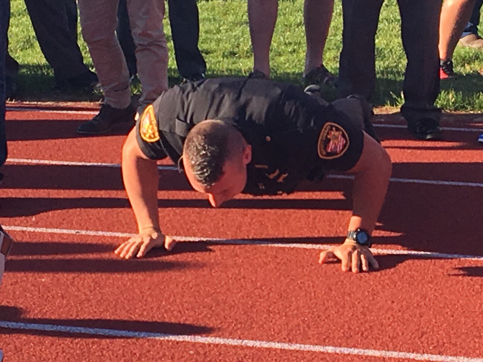 Even law enforcement officers showed up to do push-ups to support Collin Griffin in his fight against cancer (James Buechele/Staff)