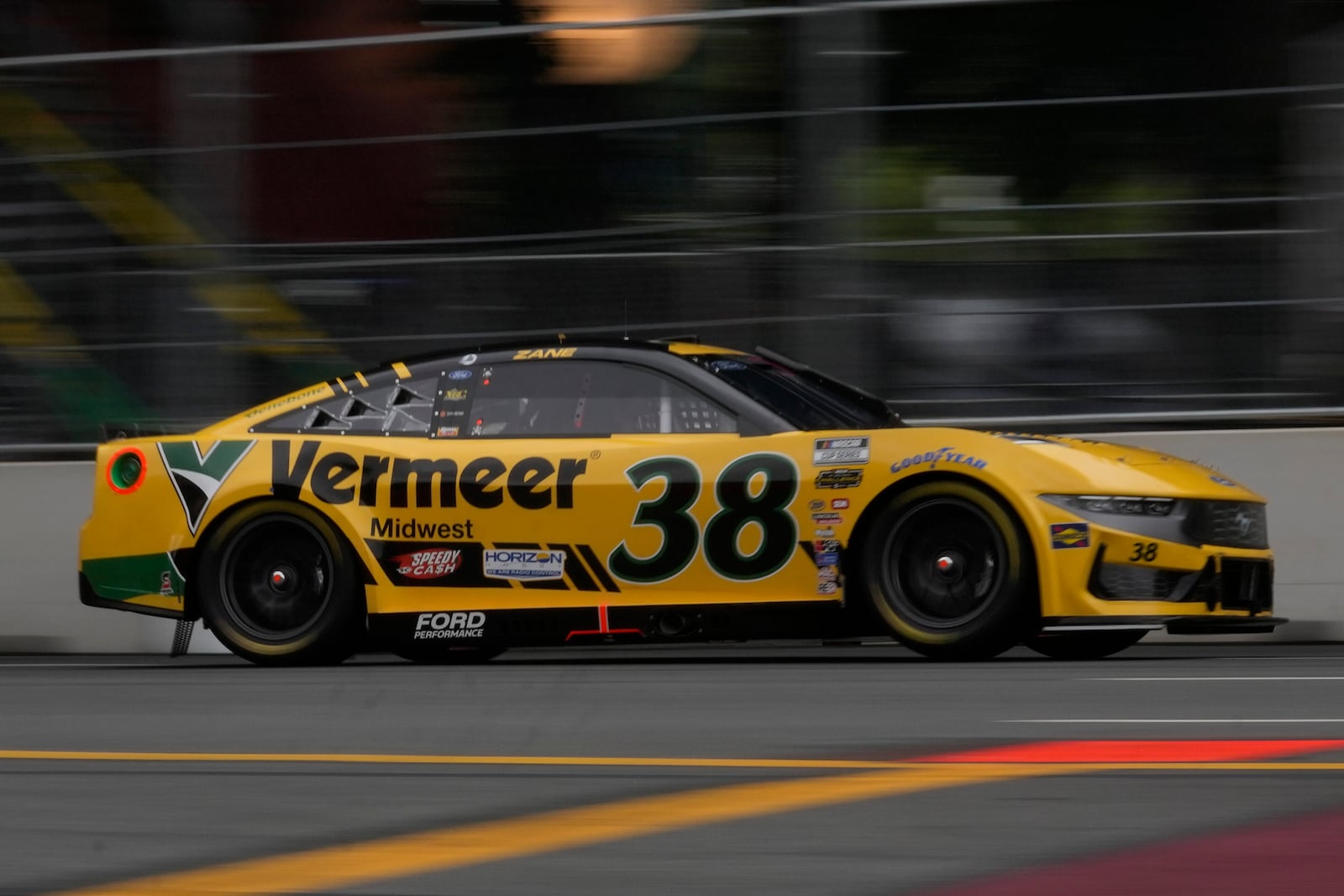 Zane Smith drives in a NASCAR Cup Series auto race at the Grant Park 165, Sunday, July 6, 2025, in Chicago. (AP Photo/Erin Hooley)
