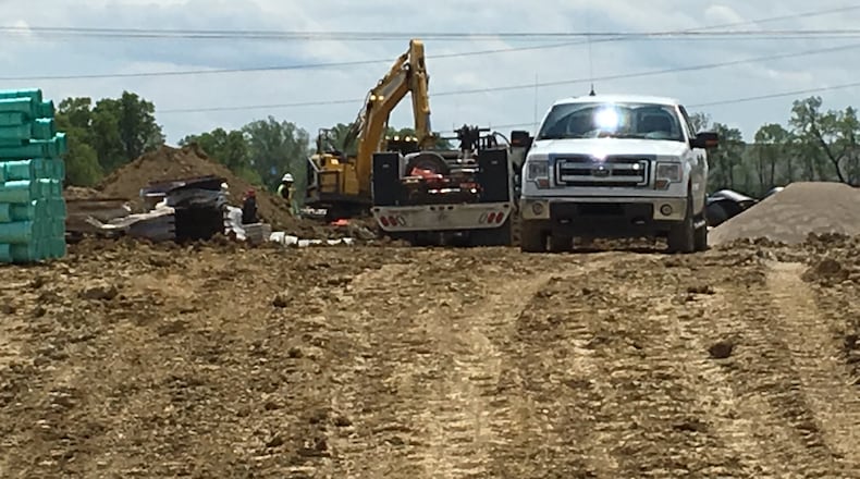Good construction weather has enabled contractors to complete a new road about three months early that will improve truck traffic in Monroe and Middletown. STAFF FILE