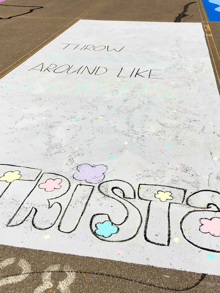 PHOTOS Lakota East seniors paint parking spots