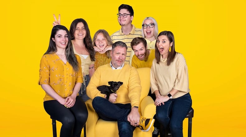 LemonGrenade Creative is a full-service marketing and design firm located in downtown Hamilton. Shown here is the current staff with owner Thommy Long in the middle, holding a dog. CONTRIBUTED